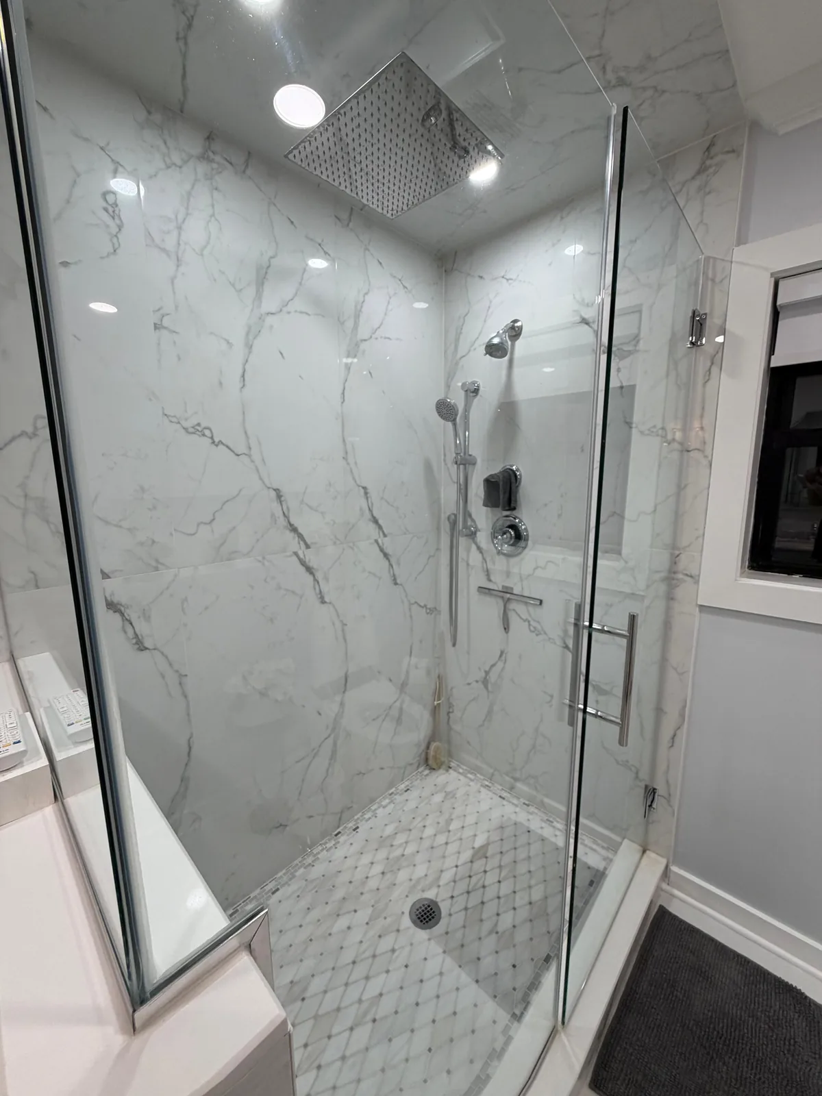Marble shower, ceiling rain head