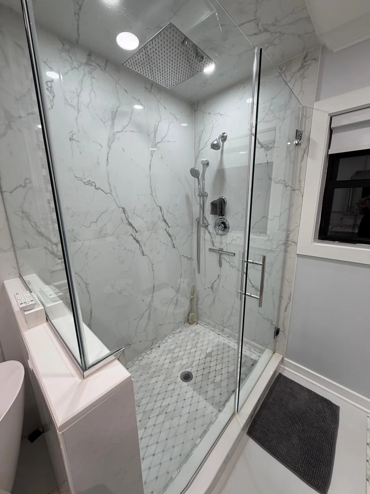 Marble shower, diamond mosaic floor