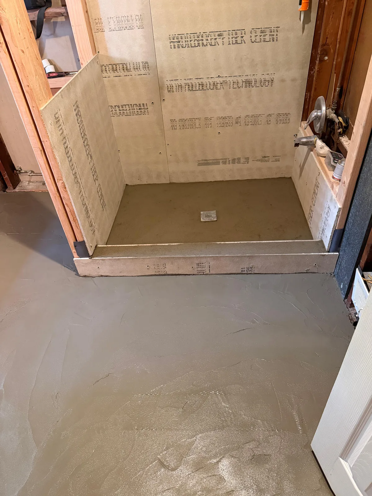 Shower curb framed before tile