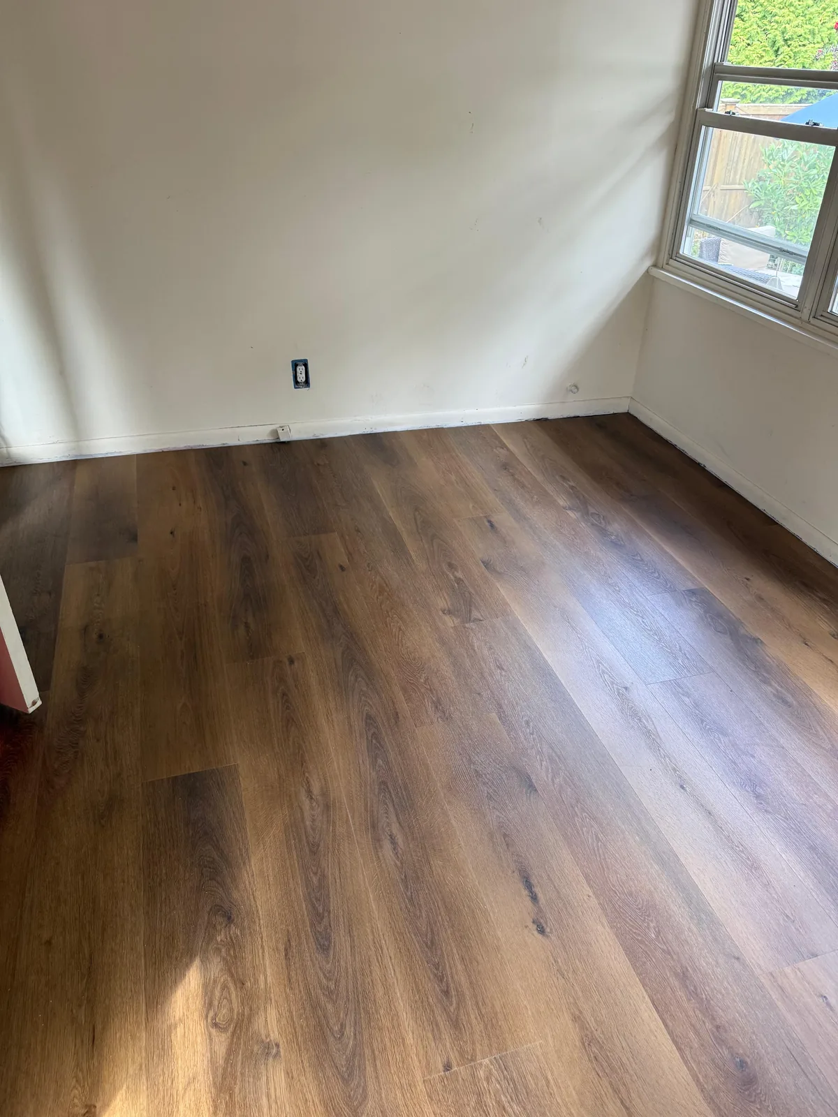 Finished wood-look plank floor