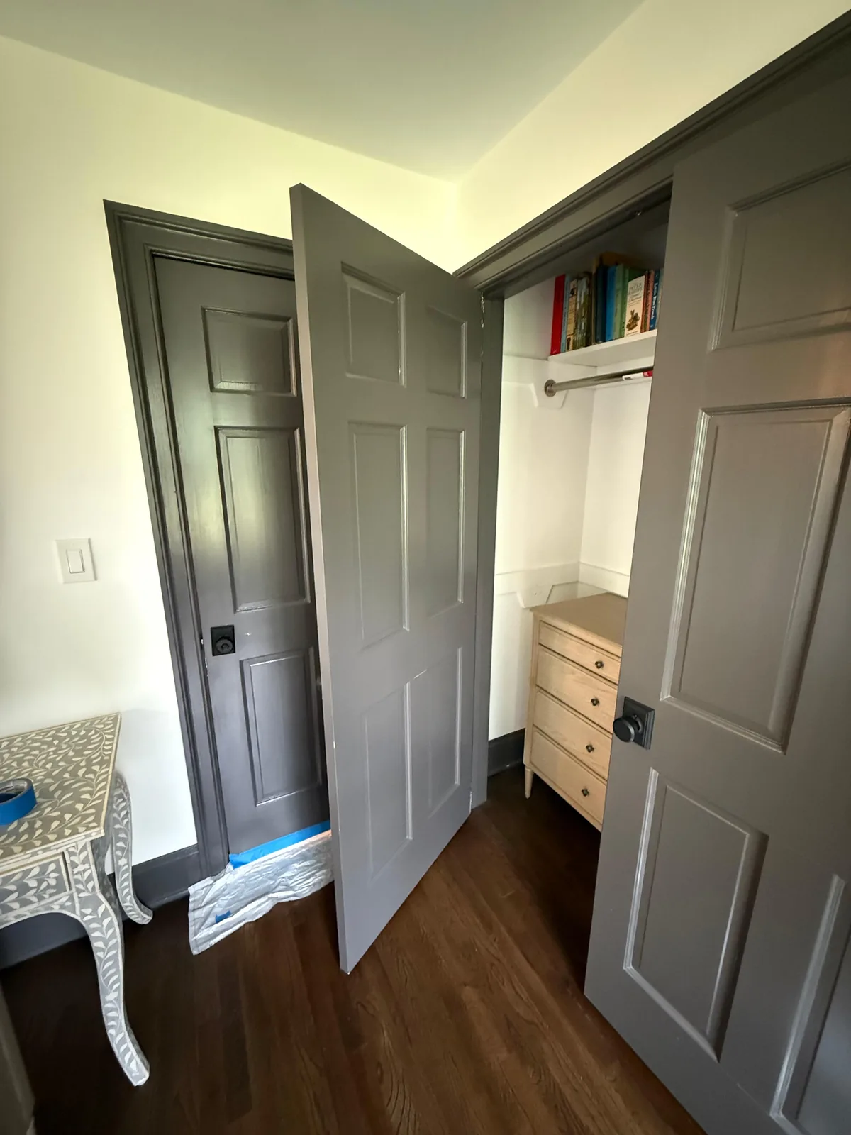 Gray closet doors, built-in dresser