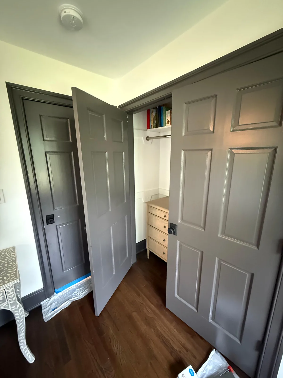 Gray closet doors open