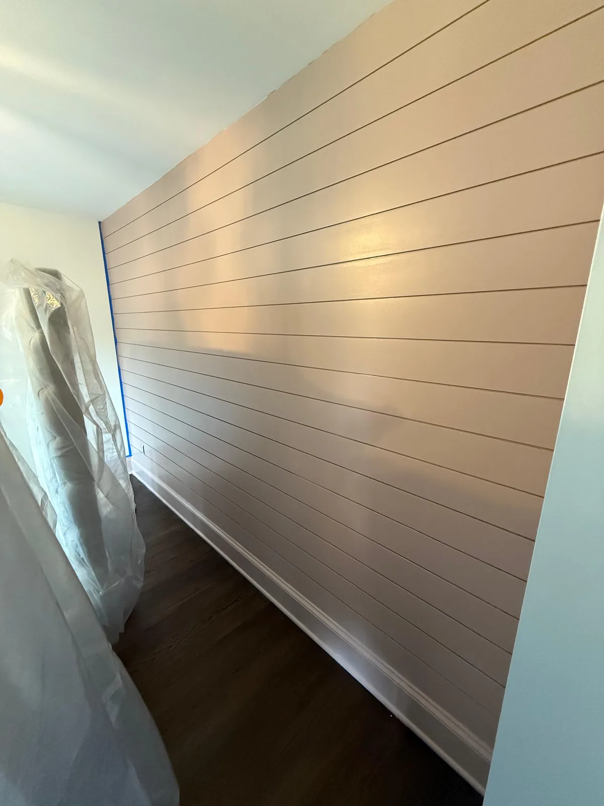 Blush shiplap accent wall