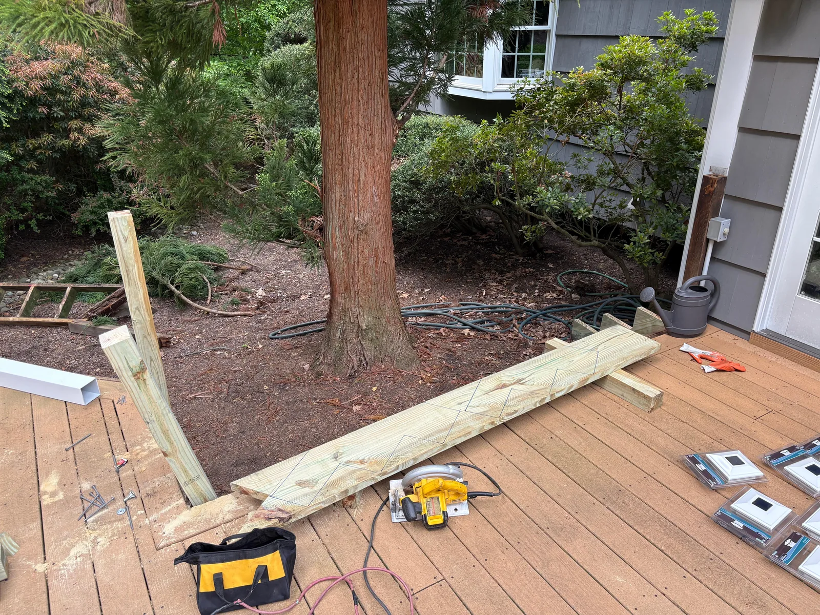Deck post framing around tree