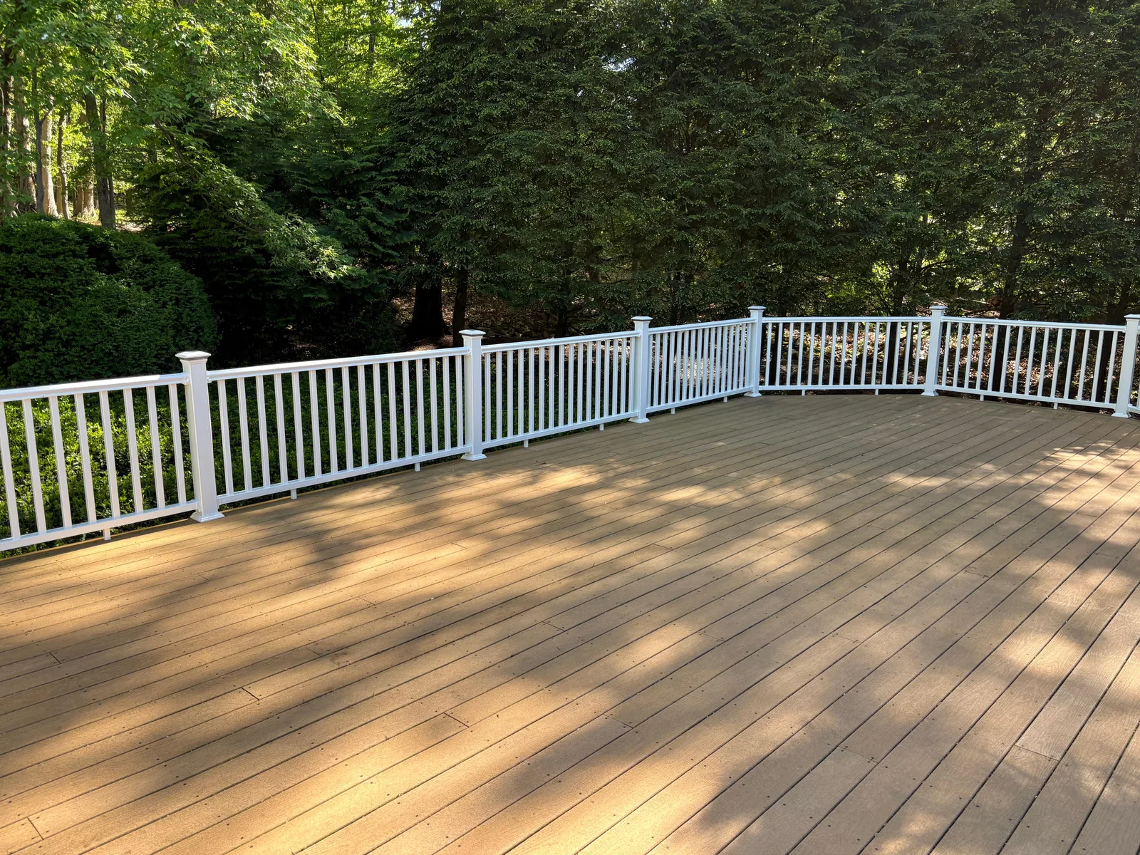 Finished deck, white railing