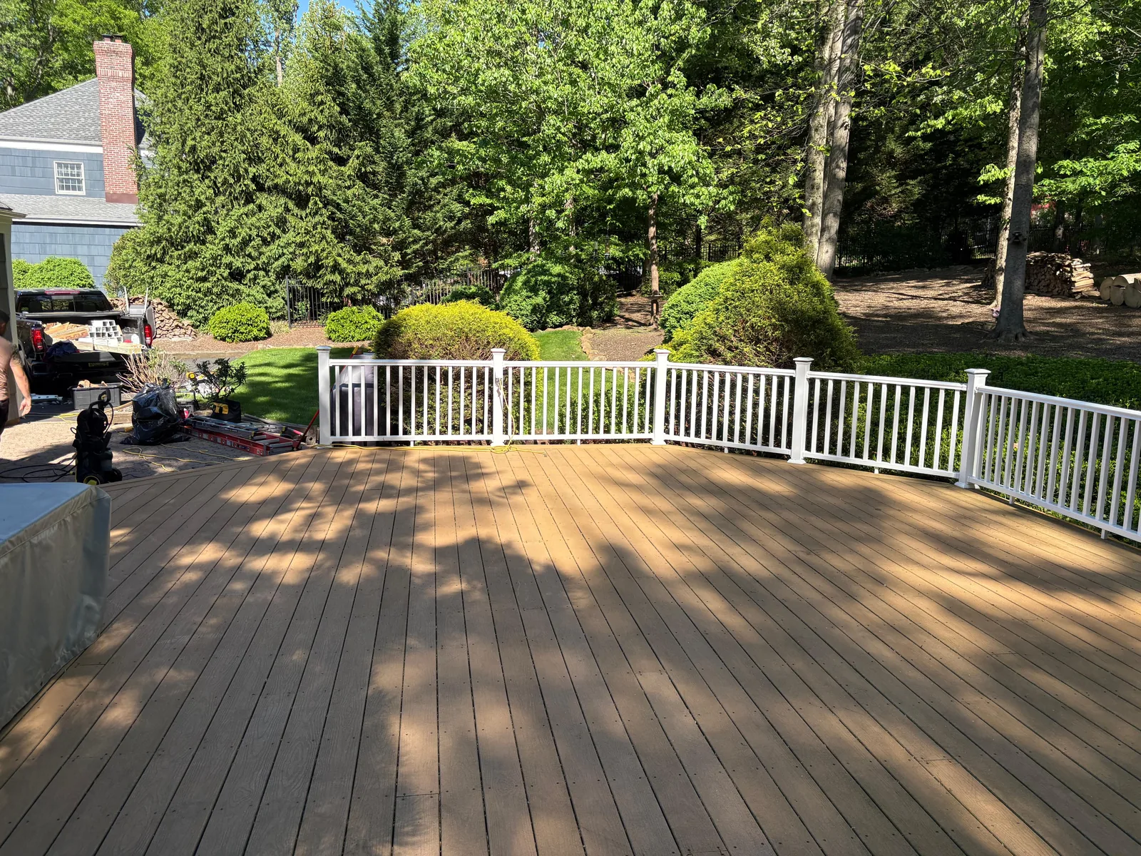 Wide deck, finished white railing