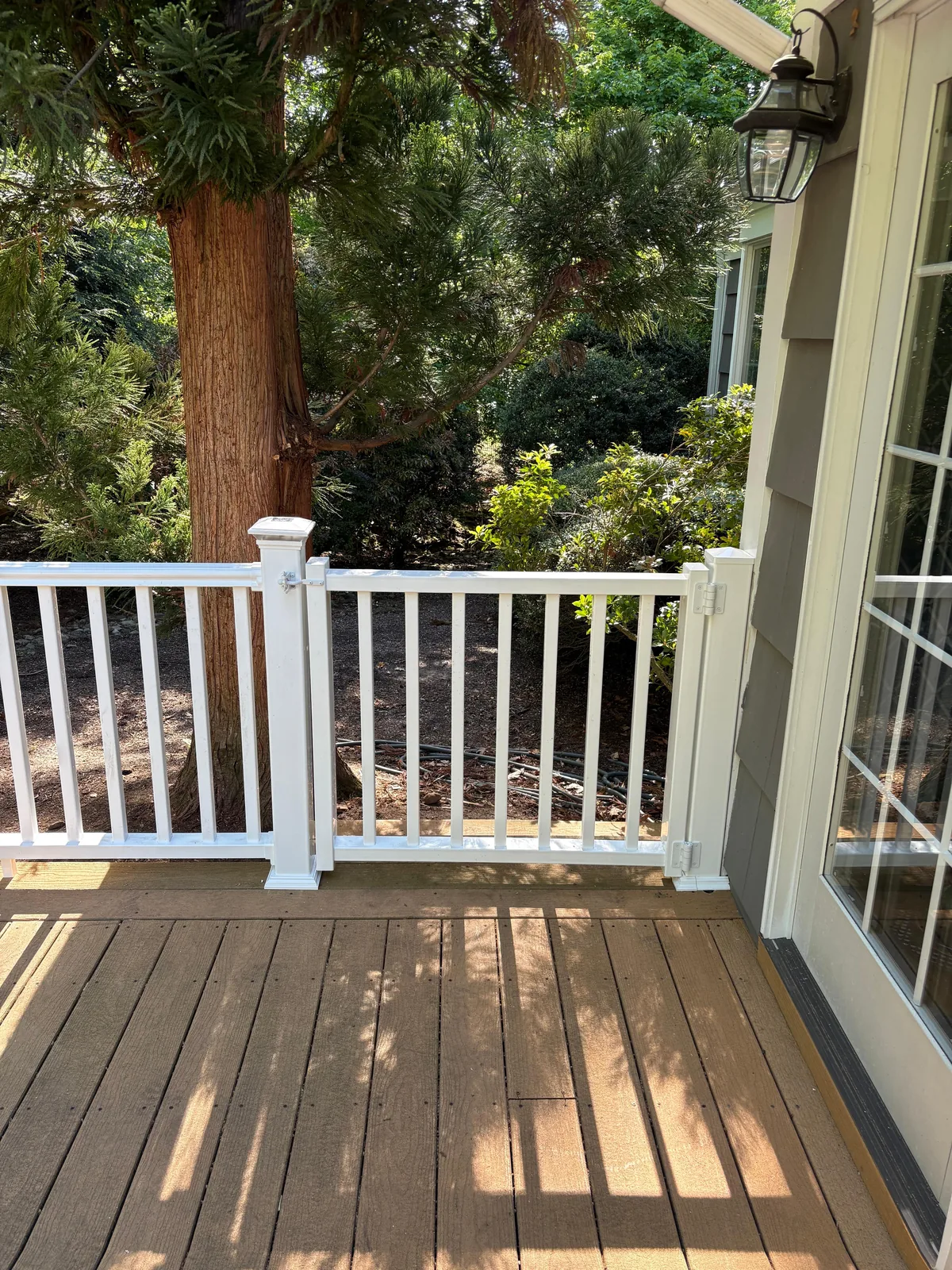 Porch, white railing, lantern