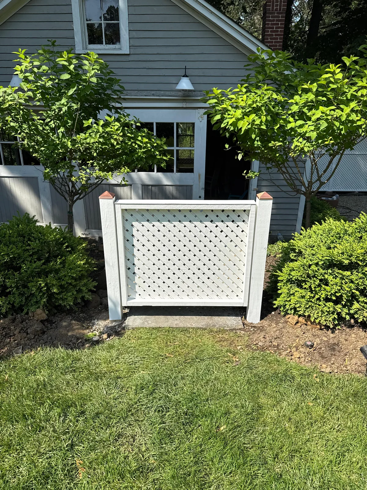White lattice yard screen