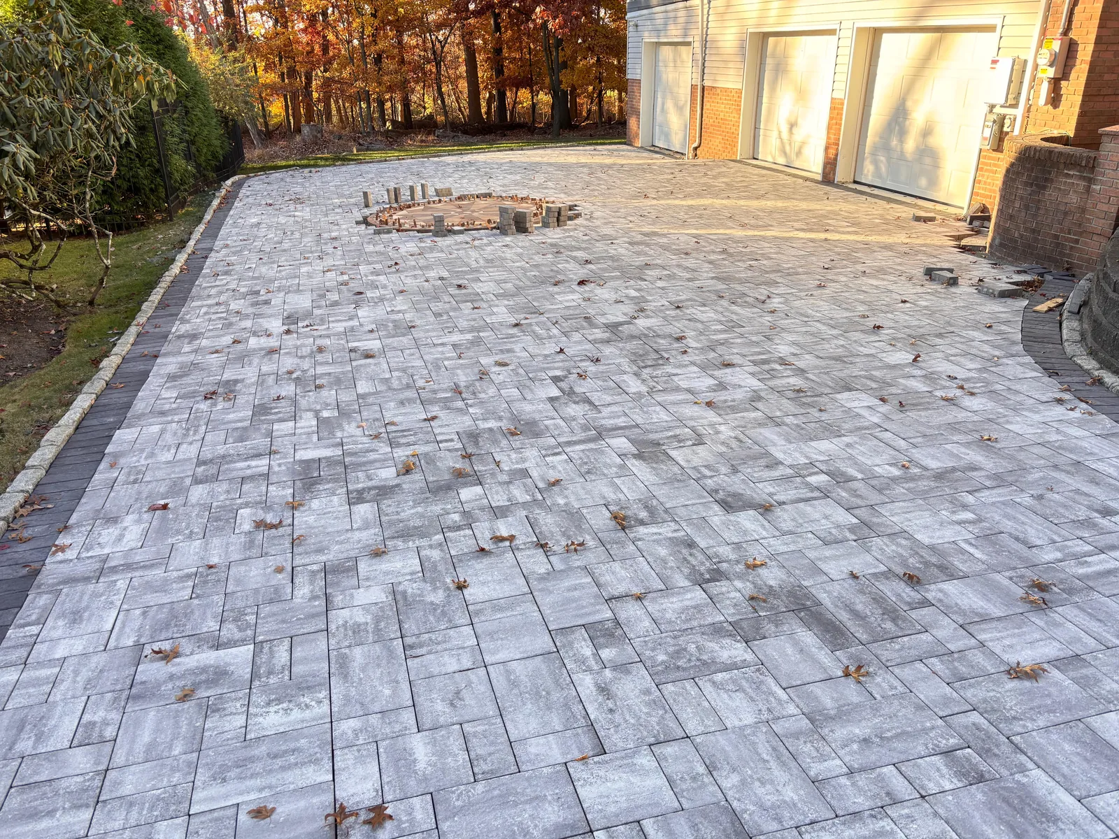 Finished paver driveway, firepit