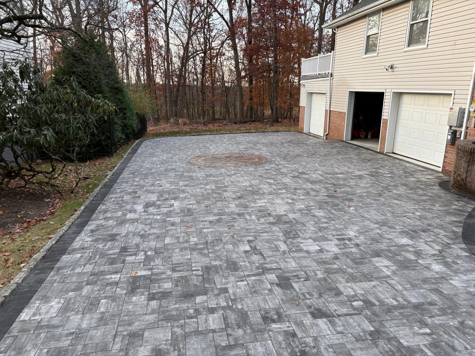 Wide paver driveway to garage