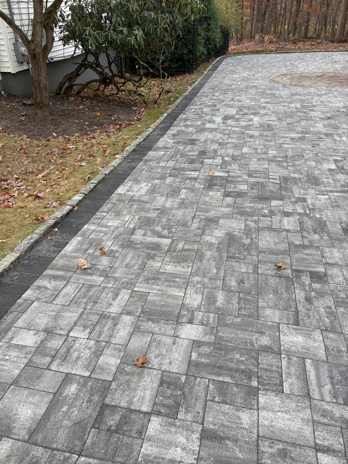 Paver driveway, cobble border